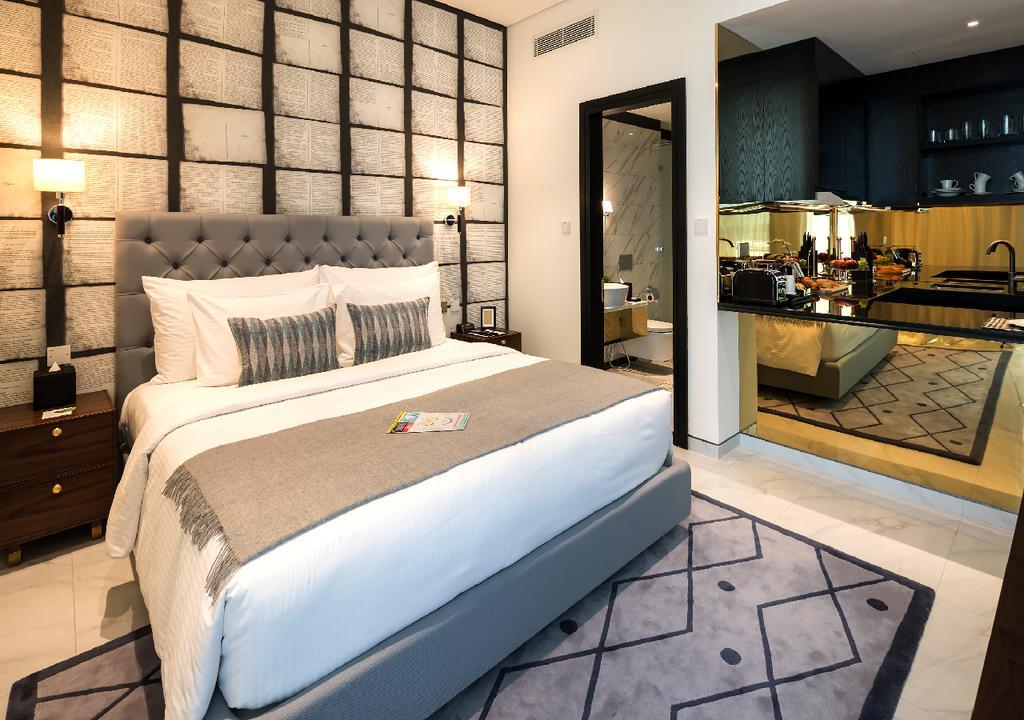 Millennium Atria Business Bay Aparthotel Dubai Bagian luar foto A bedroom at the hotel