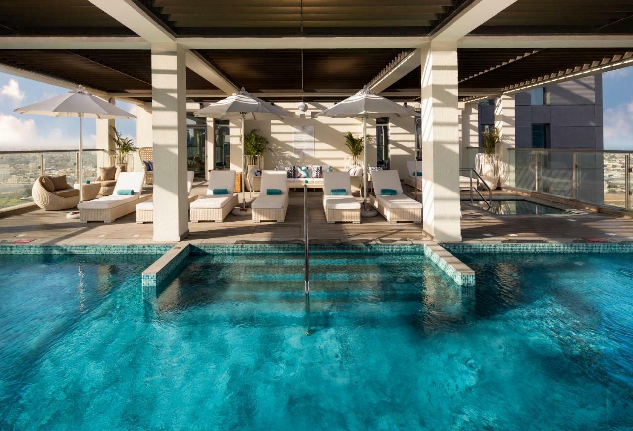 Millennium Atria Business Bay Aparthotel Dubai Bagian luar foto The rooftop pool at the W London